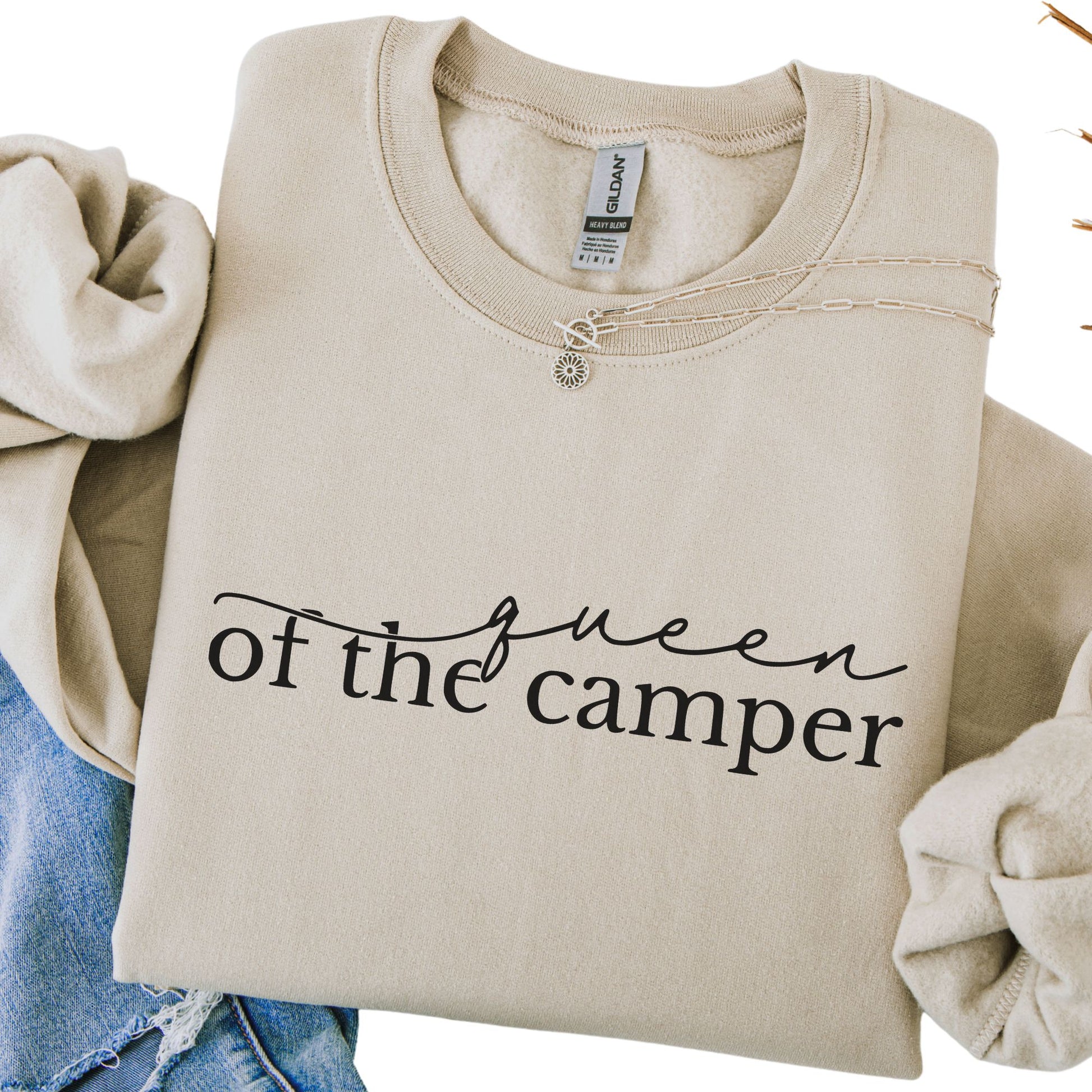 Beige sweatshirt with 'Queen of the Camper' text on a white background