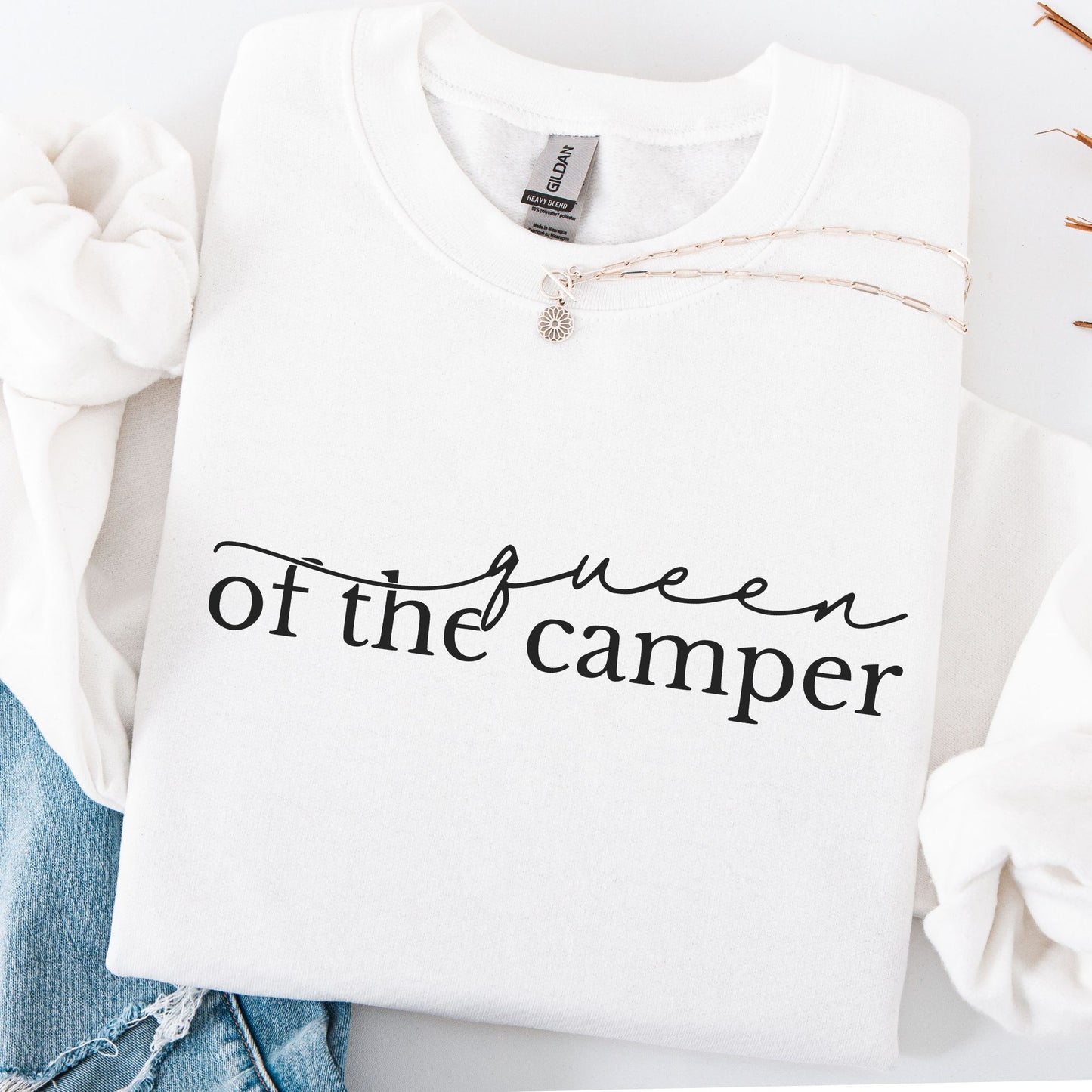 White sweatshirt with 'Queen of the Camper' text on a white background