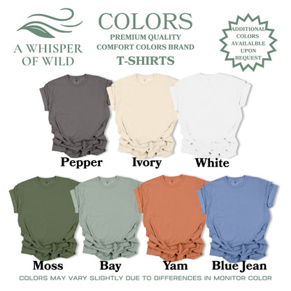 Display of t-shirts in various colors with brand name 'A Whisper of Wild' at the top.