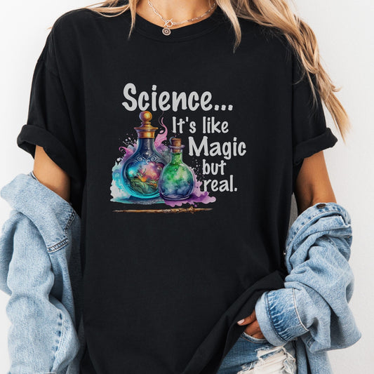 a woman wearing a black t - shirt that says science it's like magic