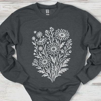 Dark gray sweatshirt with white floral heart design on a wooden surface