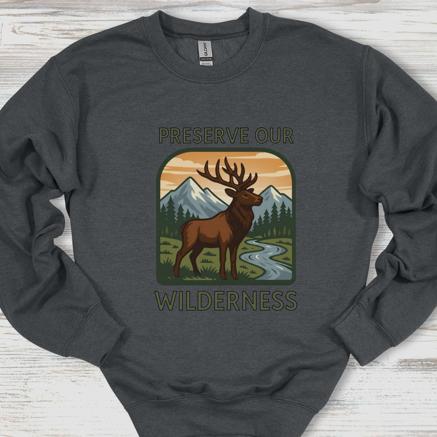 Dark gray sweatshirt with a graphic of a deer and mountains, featuring the text 'Preserve Our Wilderness'.