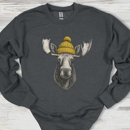 Gray sweatshirt with a moose wearing a yellow beanie on a wooden surface